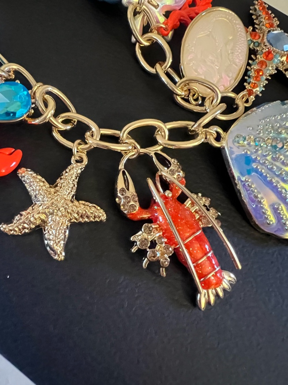 Betsey Johnson Blue Rope Necklace with Coral, Red and Iridescent Sea Charms - Picture 8 of 16